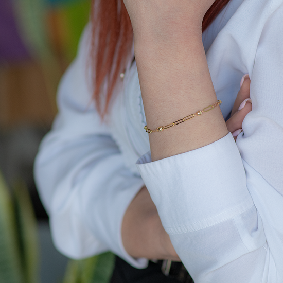 AV χρυσό γυναικείο βραχιόλι με ενωμένους κρίκους και διαμανταρισμένες μπίλιες